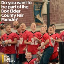 Football team on the float at Box Elder County Fair Parade in Tremonton, Utah 